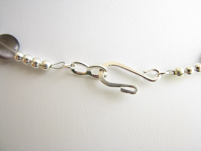 Hook and eye clasp close-up
